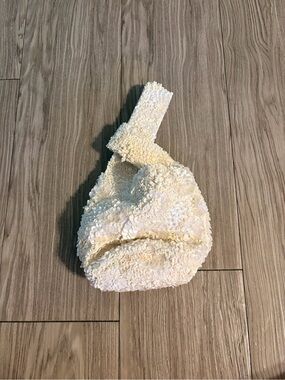 Marshalls Ivory Sequin Knot Wristlet